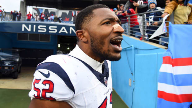 Dec 17, 2023; Nashville, Tennessee, USA; Houston Texans defensive end Jonathan Greenard (52) celebrates after a victory against the Tennessee Titans at Nissan Stadium.